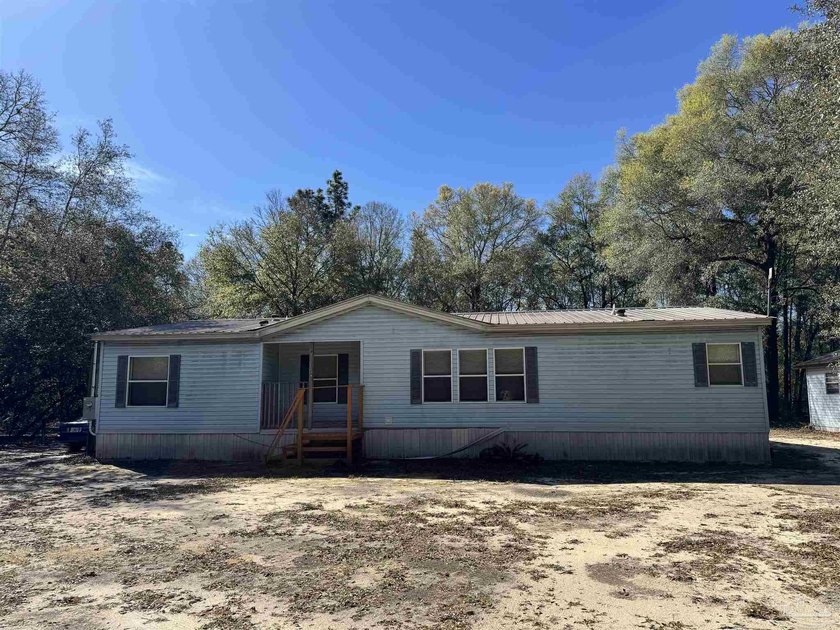 5.892 acres on Clear Creek - private, wooded and full of - Beach Home for sale in Milton, Florida on Beachhouse.com