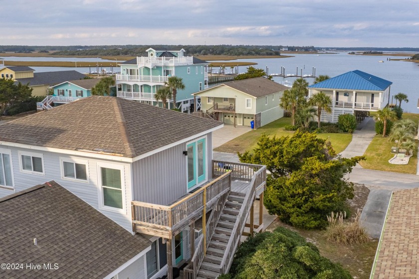 Hit the Trifecta with this incredible West-End Triplex!  This - Beach Home for sale in Oak Island, North Carolina on Beachhouse.com