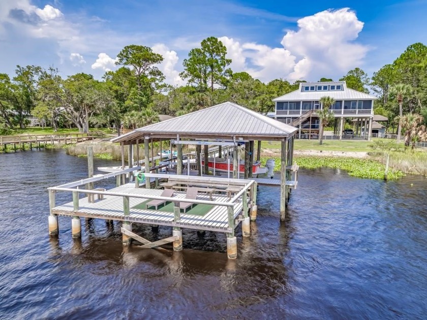 Welcome home to 42 River Drive - a unique, secluded home that - Beach Home for sale in Panacea, Florida on Beachhouse.com