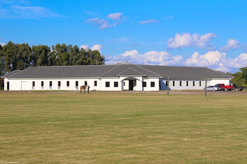 Newly constructed 52 stall show barn with huge grass riding - Beach Home for sale in Wellington, Florida on Beachhouse.com