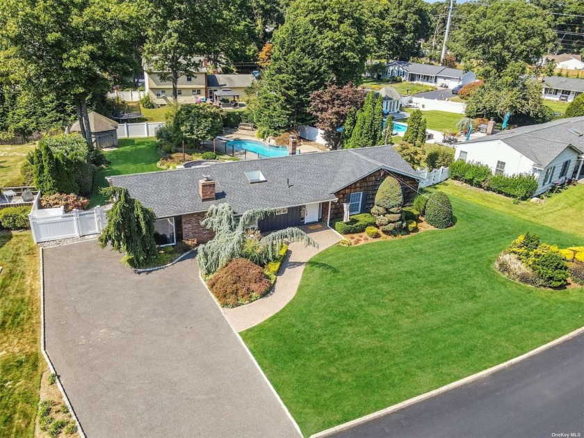 Discover the perfect blend of comfort and charm in this lovely - Beach Home for sale in Rocky Point, New York on Beachhouse.com