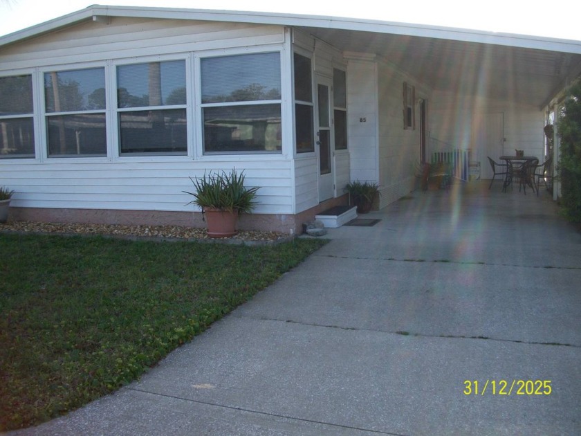 This beautifully updated 2 bedroom, 2 bathroom home combines - Beach Home for sale in Edgewater, Florida on Beachhouse.com