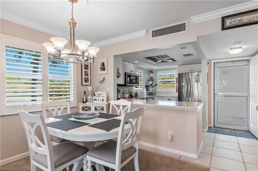 NEW Pictures!!!  Rare RENOVATED CORNER UNIT with views of pool - Beach Home for sale in Naples, Florida on Beachhouse.com