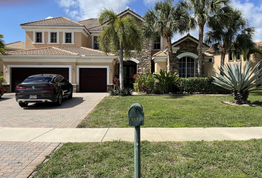 This splendid executive-style home is located in the Country - Beach Home for sale in Lake Worth, Florida on Beachhouse.com