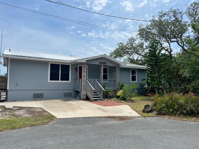 Charming Waterfront Home in Cedar Key!  Discover the serene - Beach Home for sale in Cedar Key, Florida on Beachhouse.com