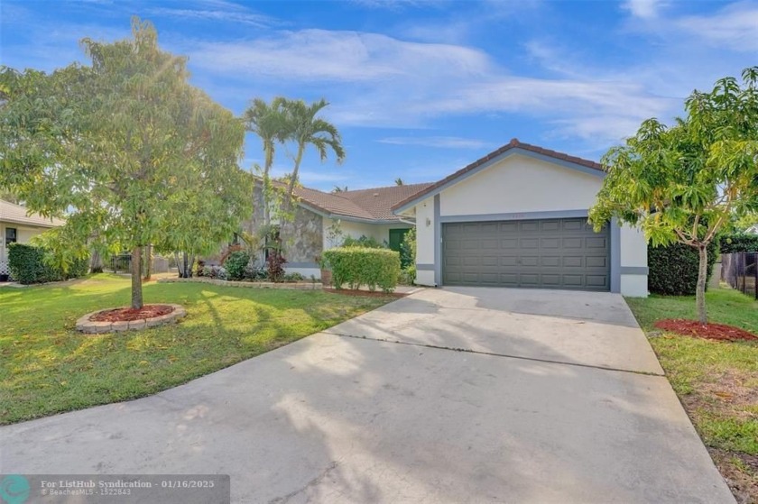 Welcome to this stunning 4 bedroom, 2.5 bathroom, renovated and - Beach Home for sale in Coral Springs, Florida on Beachhouse.com