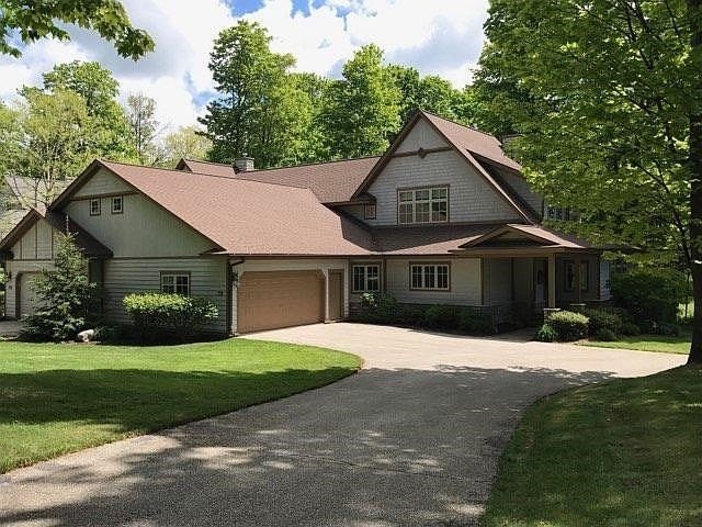 Experience the pinnacle of Northern Michigan living in this - Beach Condo for sale in Harbor Springs, Michigan on Beachhouse.com