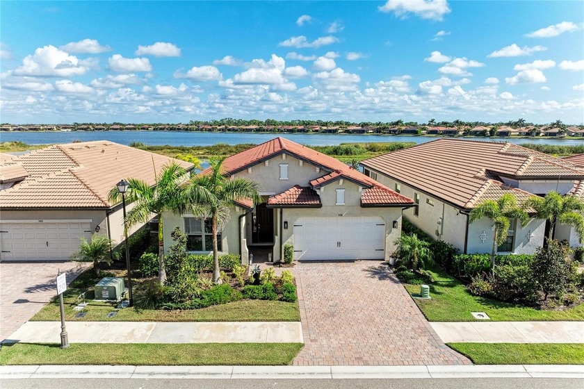 Welcome to your idyllic waterfront sanctuary! This nearly new - Beach Home for sale in Nokomis, Florida on Beachhouse.com