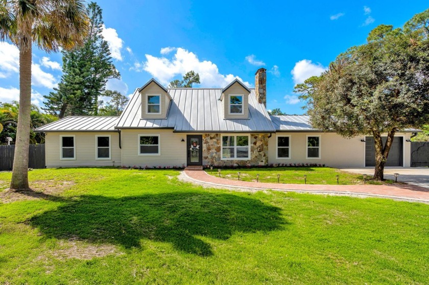 Welcome to your fully remodeled ranch-style oasis!This stunning - Beach Home for sale in West Palm Beach, Florida on Beachhouse.com
