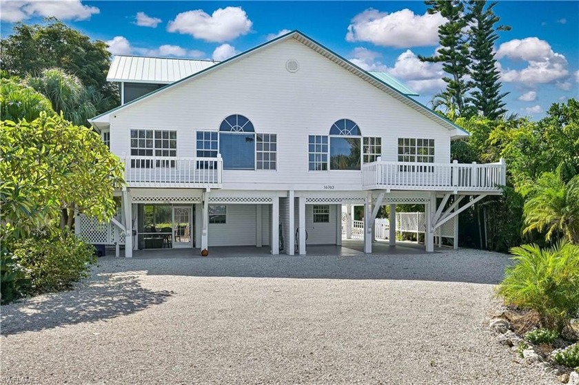 Your SOMEDAY is here! Beautifully upgraded pool home with boat - Beach Home for sale in Bokeelia, Florida on Beachhouse.com