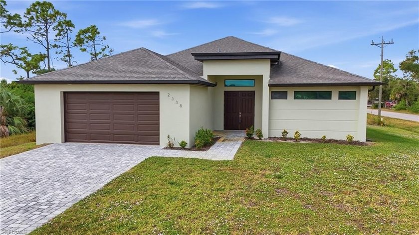Well-located in Northwest Cape Coral, this 3-bedroom, 3.5-bath - Beach Home for sale in Cape Coral, Florida on Beachhouse.com