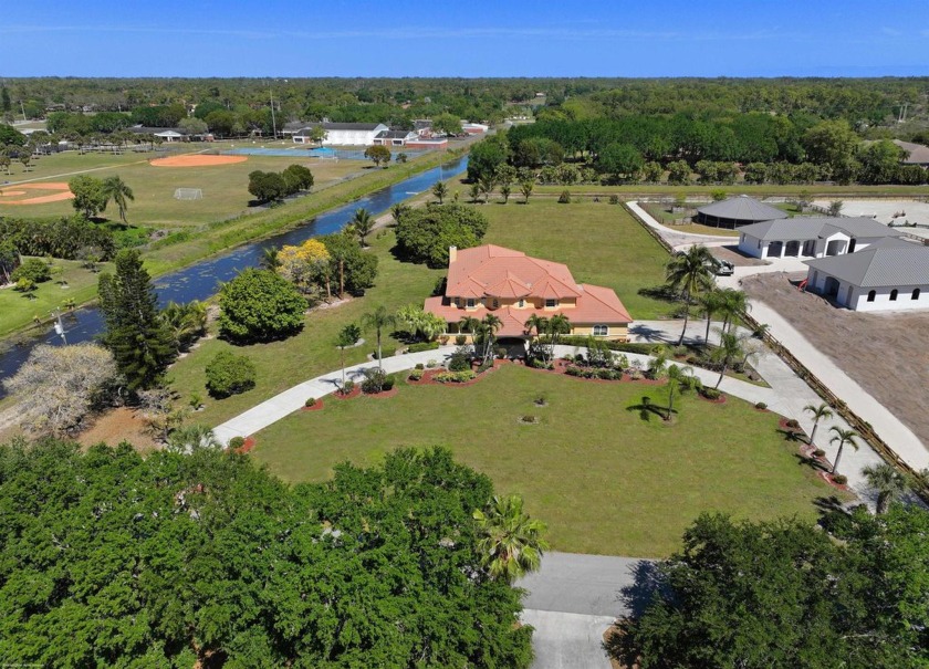 Located on a spacious 2.45-acre lot, this inviting home is an - Beach Home for sale in Wellington, Florida on Beachhouse.com