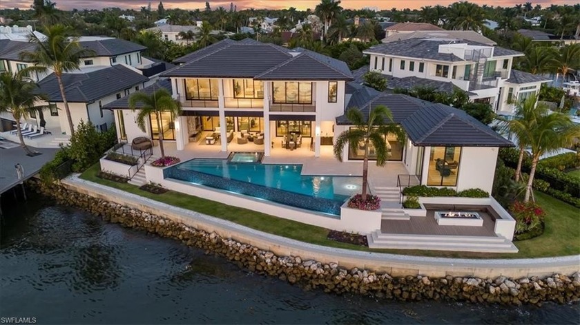 Step into the pinnacle of luxury waterfront living with this - Beach Home for sale in Naples, Florida on Beachhouse.com