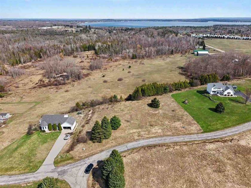 Elevated and private, this beautiful building site in Clover - Beach Lot for sale in Charlevoix, Michigan on Beachhouse.com