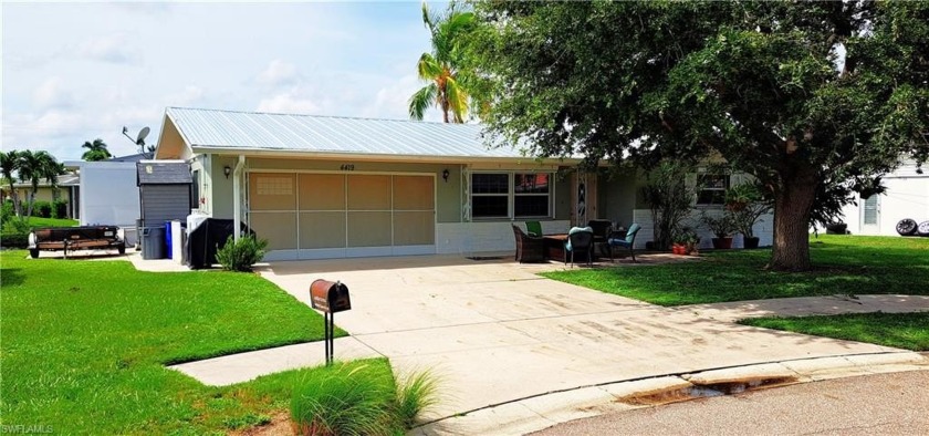 Experience Waterfront Living in Lochmoor Waterway Estates! - Beach Home for sale in North Fort Myers, Florida on Beachhouse.com