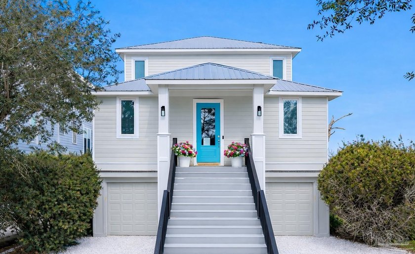 Coastal luxury meets laid-back waterfront living in this - Beach Home for sale in Perdido Key, Florida on Beachhouse.com