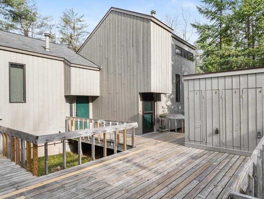 This furnished, highly sought after end unit features 2-bedrooms - Beach Home for sale in Harbor Springs, Michigan on Beachhouse.com