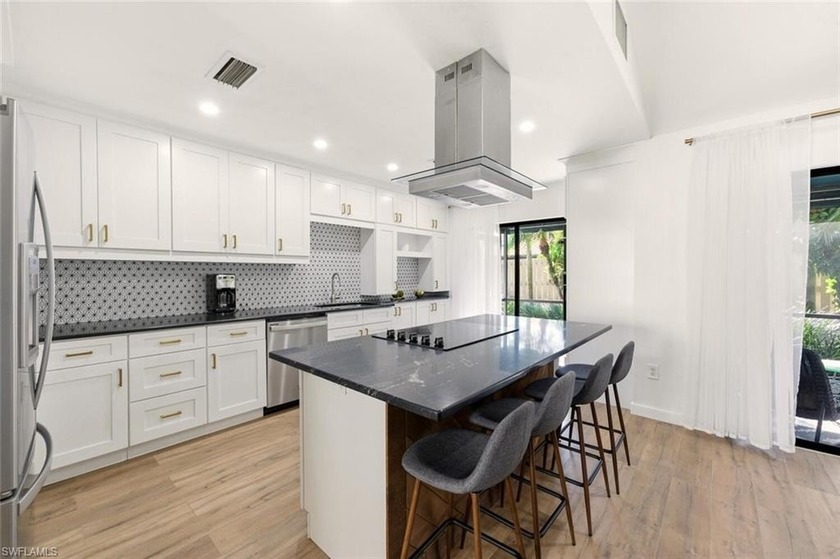 Located less than a mile away from the spectacular Vanderbilt - Beach Home for sale in Naples, Florida on Beachhouse.com