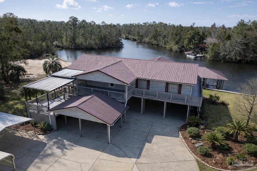 Waterfront living meets space, privacy, and functionality at - Beach Home for sale in Milton, Florida on Beachhouse.com