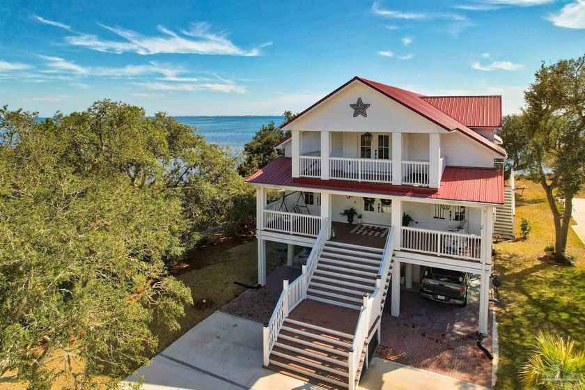 A beautifully rebuilt 3-bed, 2-bath home completed in 2023 - Beach Home for sale in Gulf Breeze, Florida on Beachhouse.com