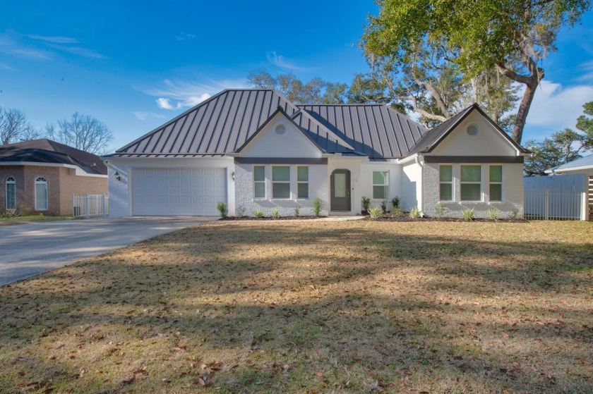 Waterfront living with indescribable sunsets overlooking  Alaqua - Beach Home for sale in Freeport, Florida on Beachhouse.com