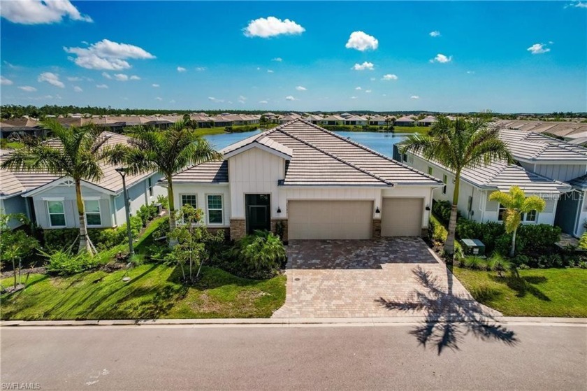 Welcome to this beautiful 3 CAR GARAGE home in the resort-style - Beach Home for sale in Bonita Springs, Florida on Beachhouse.com