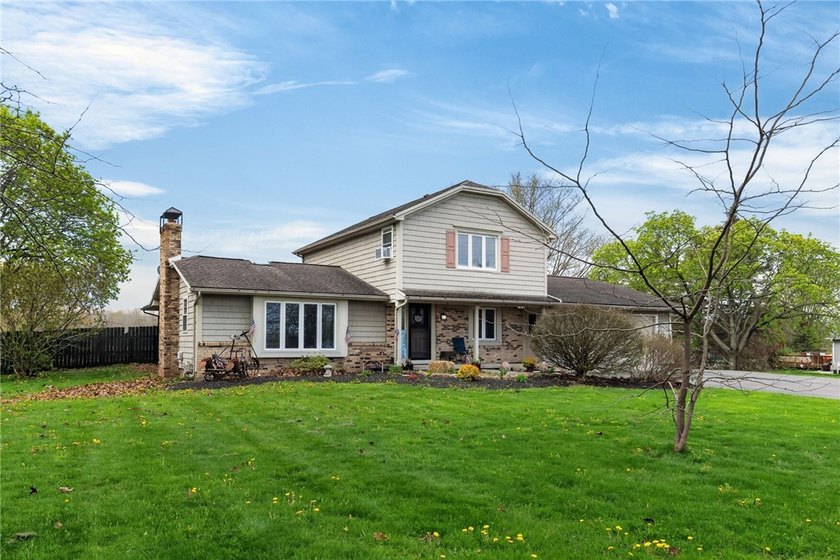 Welcome to 99 Moul Road! This gorgeous 4 Bedroom Colonial sits - Beach Home for sale in Hilton, New York on Beachhouse.com