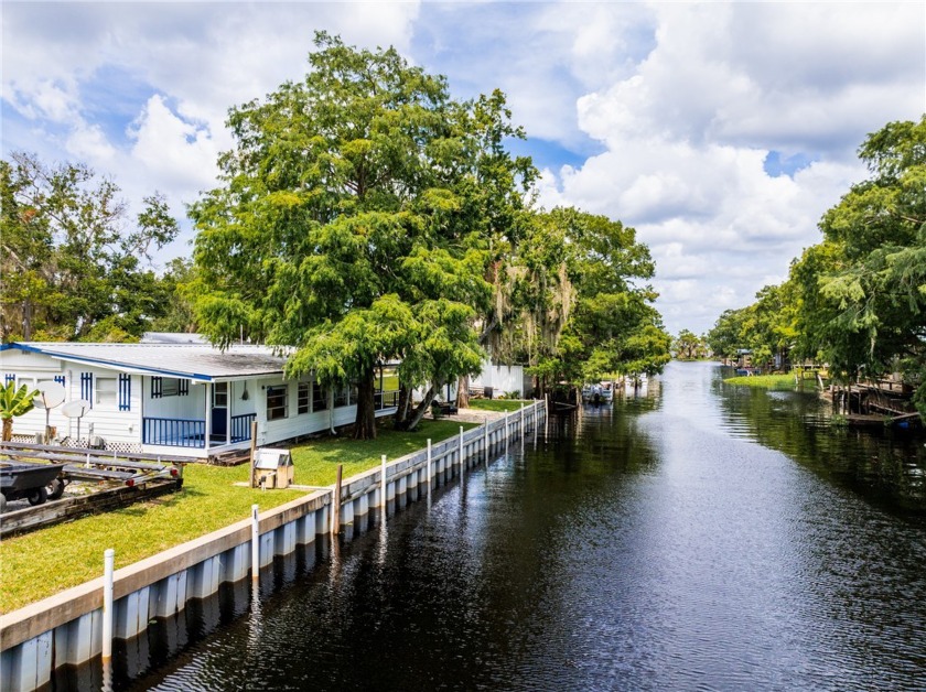 Waterfront retreat on the beautiful Blue Cypress Lake! Adorable - Beach Home for sale in Vero Beach, Florida on Beachhouse.com
