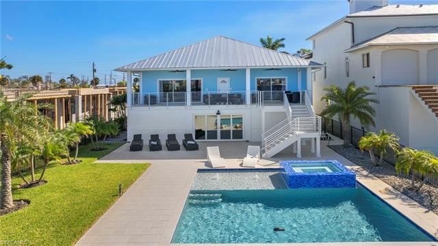 This Elevated BOATERS DREAM HOME on an OVERSIZED LOT is what - Beach Home for sale in Fort Myers Beach, Florida on Beachhouse.com
