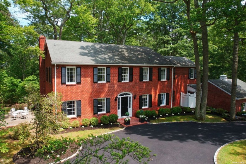 Step into the timeless elegance of this classic center hall - Beach Home for sale in Mill Neck, New York on Beachhouse.com