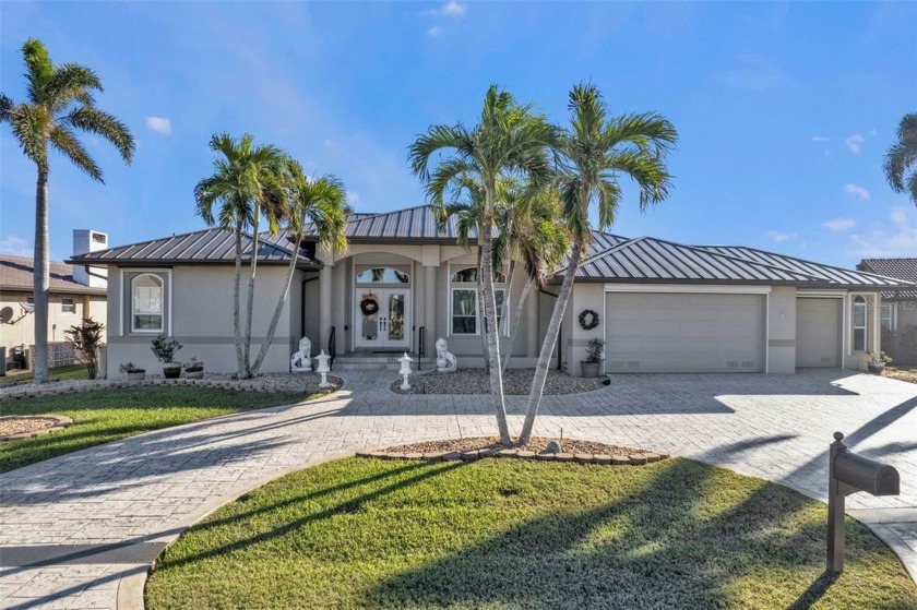 This stunning, impeccably maintained, custom-built home, crafted - Beach Home for sale in Punta Gorda, Florida on Beachhouse.com