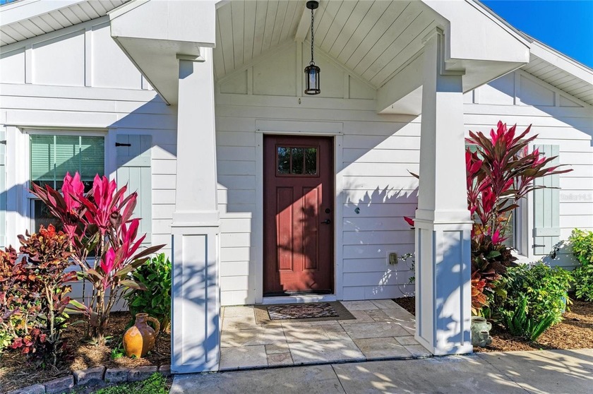 Solid concrete block construction meets elevated coastal living - Beach Home for sale in Palmetto, Florida on Beachhouse.com