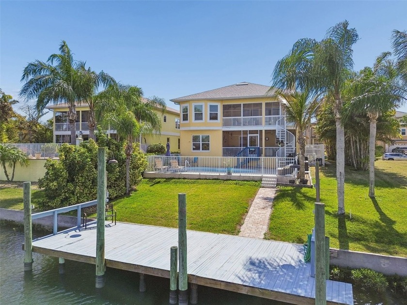 Welcome to your ultimate multi-generational Gulf-front retreat - Beach Home for sale in New Port Richey, Florida on Beachhouse.com