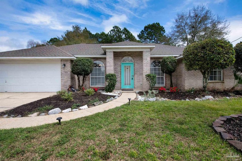 Experience the Best of Navarre Living! This charming 4-bedroom - Beach Home for sale in Navarre, Florida on Beachhouse.com