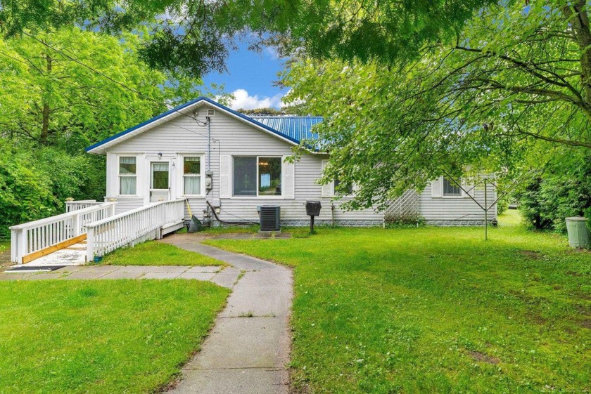 Wake up to the sound of the waves and stunning views with 50 - Beach Home for sale in Carsonville, Michigan on Beachhouse.com