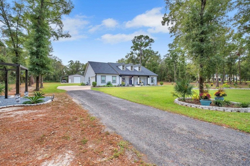 Discover this stunning, one-of-a-kind home built by Pafford - Beach Home for sale in Crawfordville, Florida on Beachhouse.com