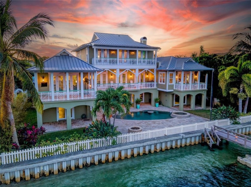 This spectacular Key West inspired home sits on a double lot in - Beach Home for sale in Treasure Island, Florida on Beachhouse.com