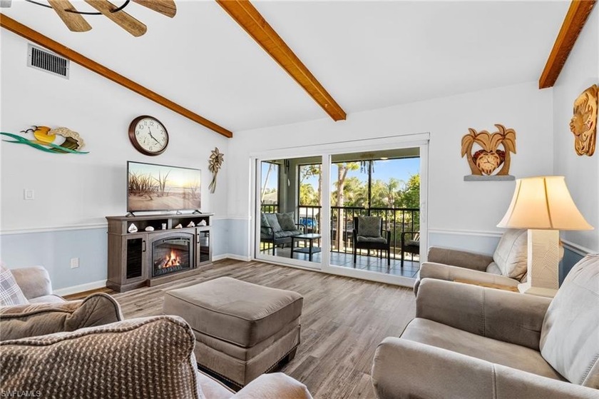 GULF-ACCESS CANAL VIEWS - UPDATED OPEN FLOOR PLAN - SCREENED - Beach Condo for sale in North Fort Myers, Florida on Beachhouse.com