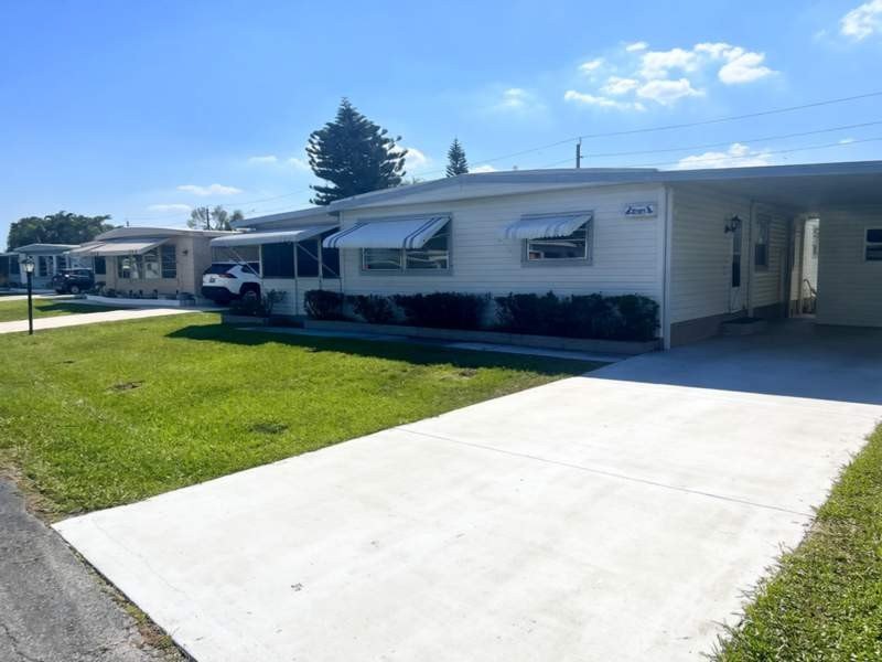 This charming 1248 square foot mobile home, built in 1982 by - Beach Home for sale in Boynton Beach, Florida on Beachhouse.com