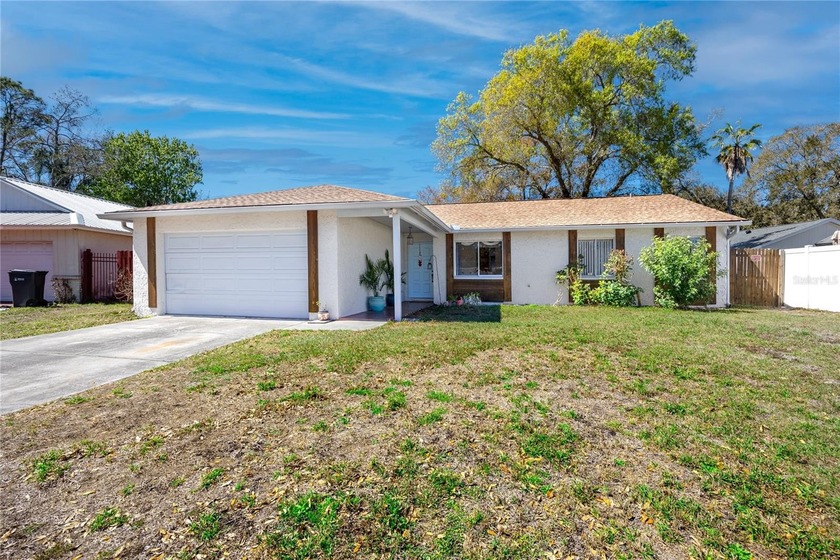 Beautifully upgraded and move-in ready, this 4-bedroom, 2-bath - Beach Home for sale in Tampa, Florida on Beachhouse.com