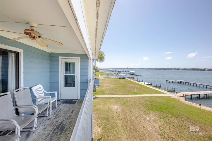 LAGOON-FRONT LIVING WITH DEEDED BEACH ACCESS!Discover the charm - Beach Condo for sale in Gulf Shores, Alabama on Beachhouse.com