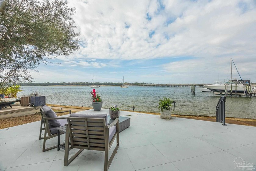 Experience true waterfront living on Bayou Grande in this - Beach Home for sale in Pensacola, Florida on Beachhouse.com