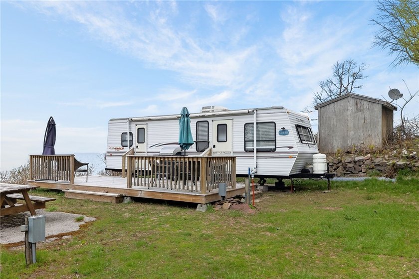 Enjoy lake front living with out the hassle, this awesome 1 - Beach Home for sale in Sodus Point, New York on Beachhouse.com