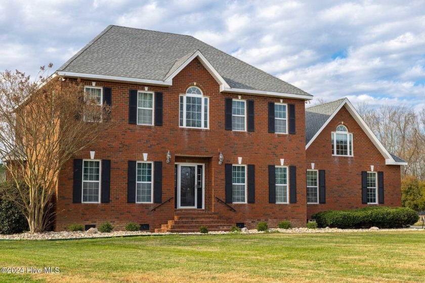 This custom-built home truly has it all, offering a perfect - Beach Home for sale in Currituck, North Carolina on Beachhouse.com