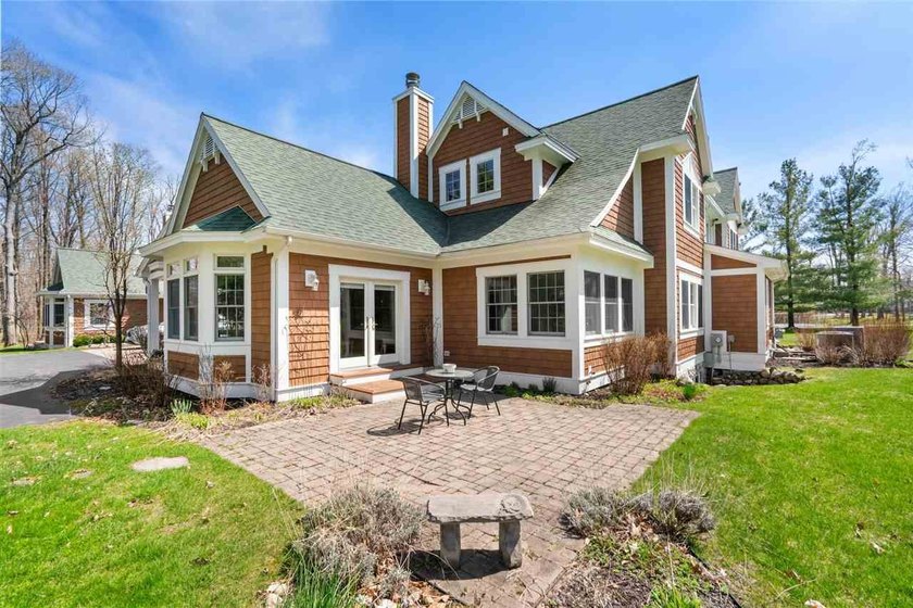 A classic cottage-inspired attached home in a private setting - Beach Condo for sale in Harbor Springs, Michigan on Beachhouse.com