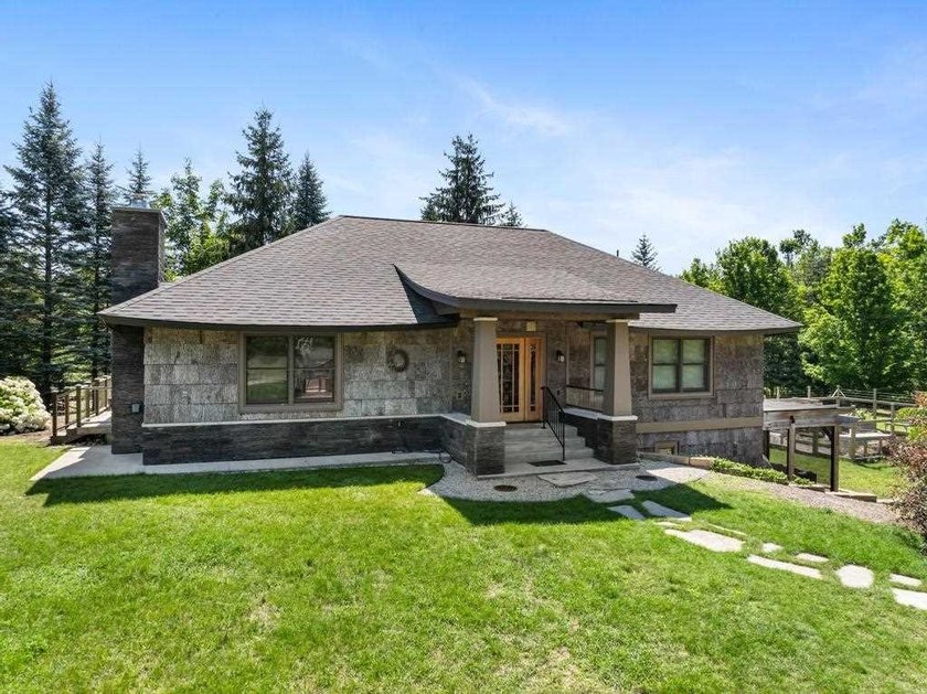Stunning and thoughtfully built in 2015, this home perfectly - Beach Home for sale in Alanson, Michigan on Beachhouse.com