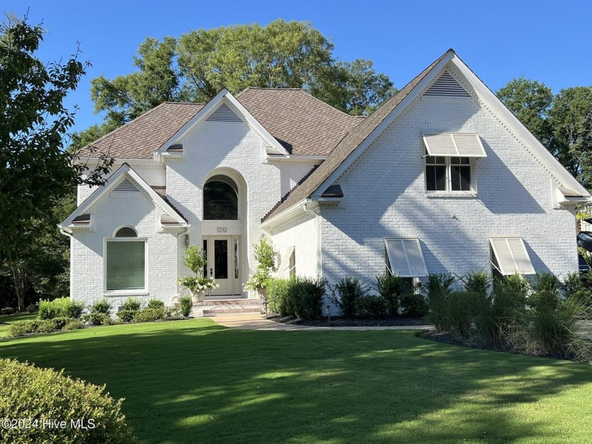 This beautifully crafted all-brick home is situated on a - Beach Home for sale in Wilmington, North Carolina on Beachhouse.com