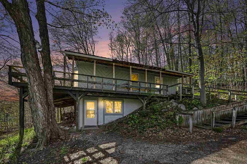 Welcome to 6273 Maple Grove Rd! Set on just over 24 acres, this - Beach Home for sale in Charlevoix, Michigan on Beachhouse.com