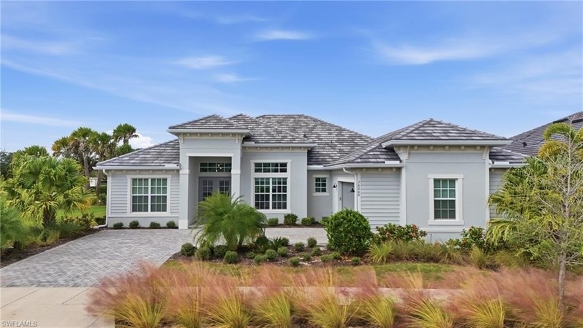 Impeccable 3-Bedroom + Den Home with Golf and Lake Views in - Beach Home for sale in Punta Gorda, Florida on Beachhouse.com