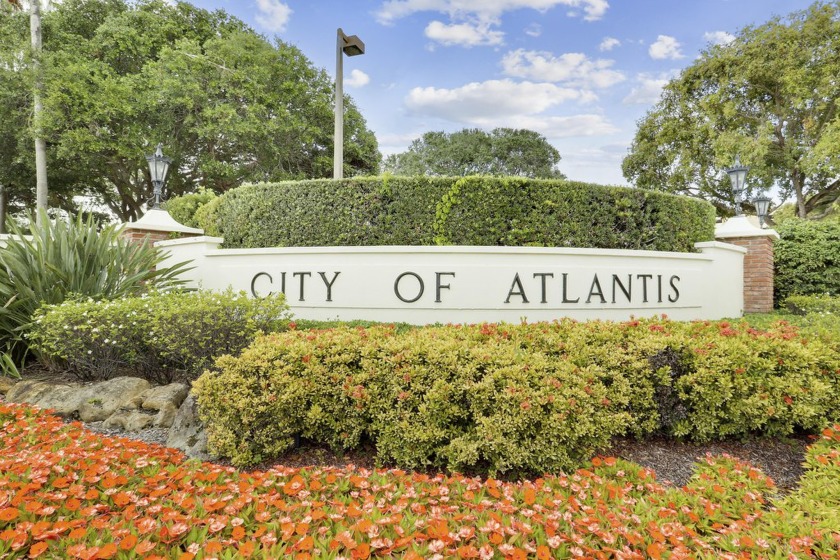 This charming single-family residence boasting 2 bedrooms and 2 - Beach Home for sale in Atlantis, Florida on Beachhouse.com